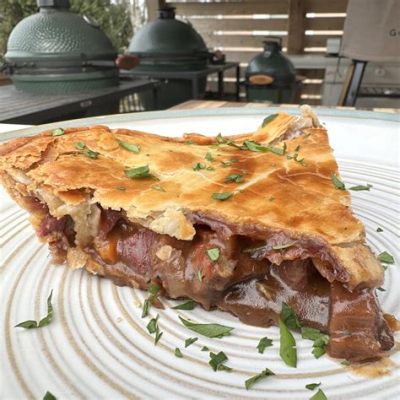  Steak and Ale Pie: Một Sự Giao Thoa Hoàn Hảo Giữa Thịt Nướng Ngọt và Bia Lạnh Mát!